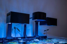 Load image into Gallery viewer, Three 3d printed light shades over a fish tank, one of which is the AI Prime Light Shade and the other two are another Eel River Coral design.