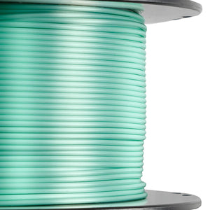 Close-up shot of mint green filament.